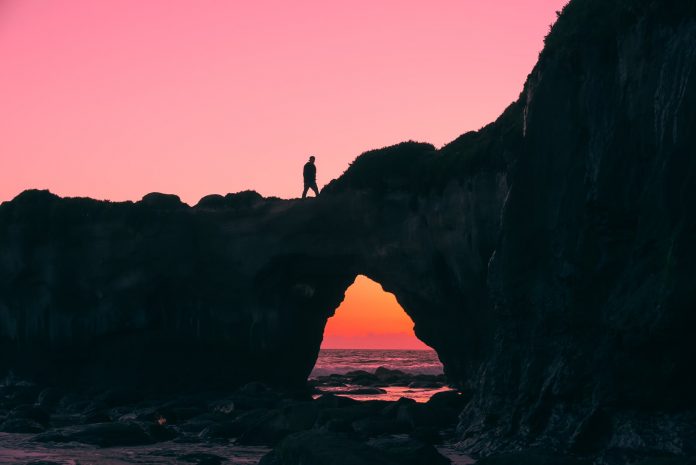 pexels-photo-931911 silhouette of man on rock walking during nightime